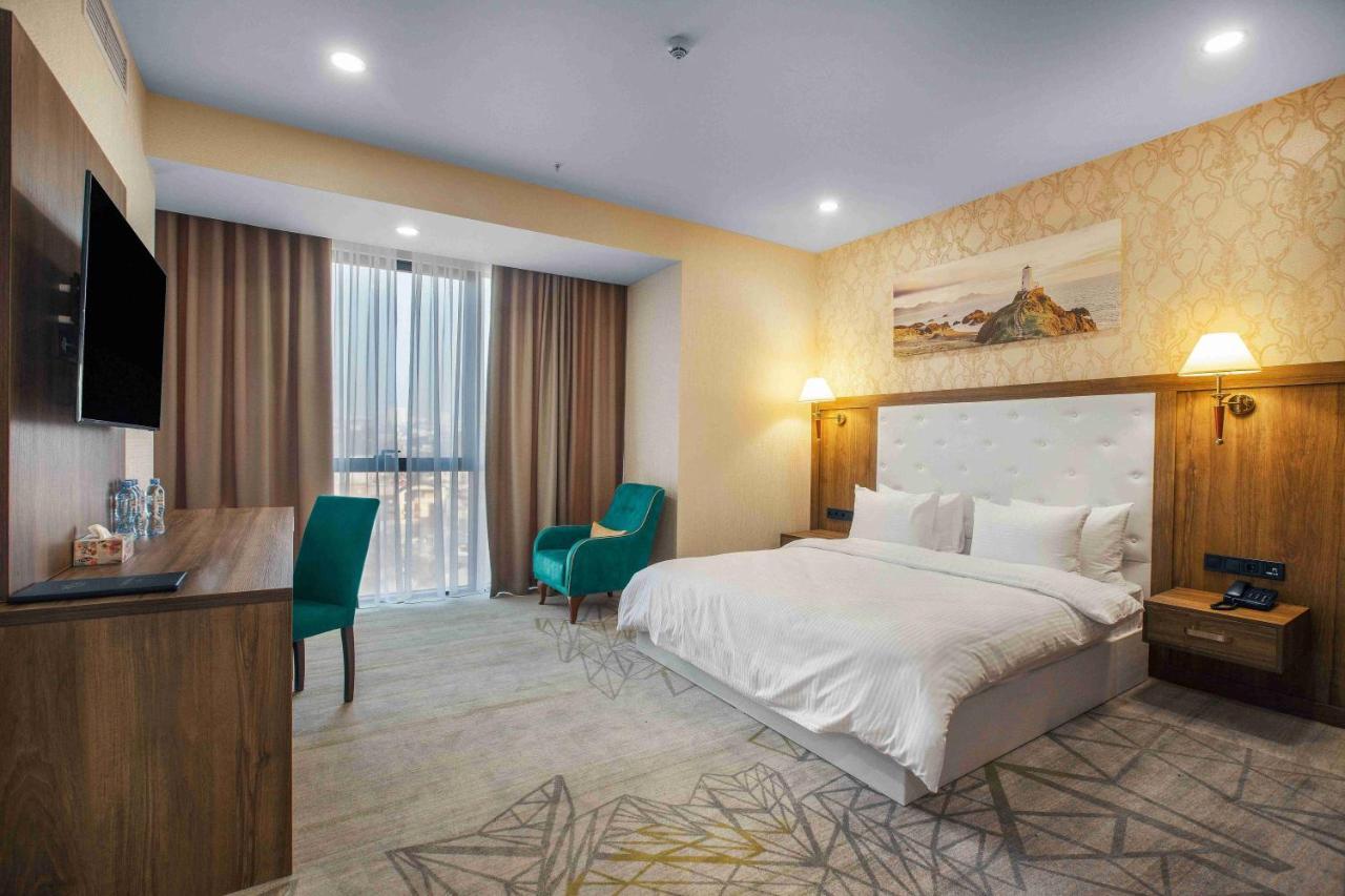 Royal Tulip Hotel & Casino, تبليسي المظهر الخارجي الصورة Deluxe room